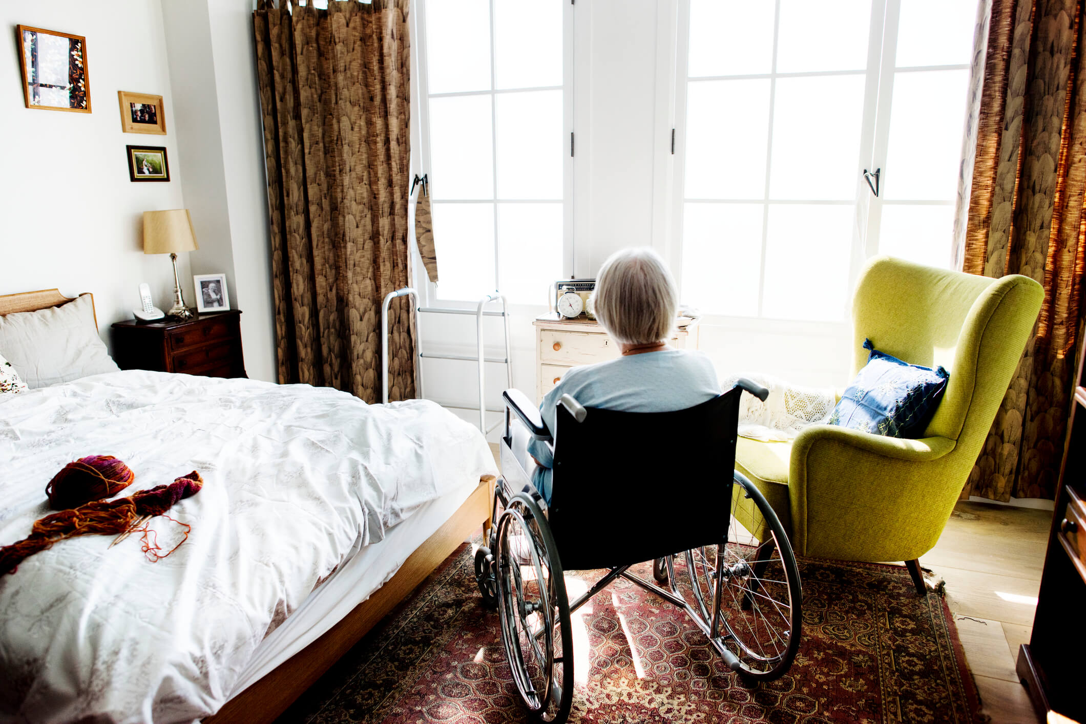elderly woman in wheelchair in a nursing home